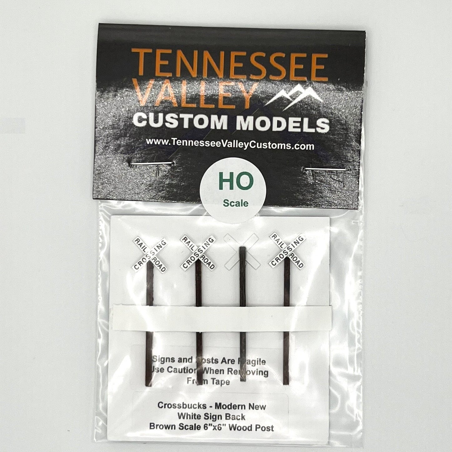 Model Railway Sign, Model Railroad Sign, Modern Cross bucks,White background, x shape, four pack, Model Railroad Layout, Diorama, metal pole, white post, brown post, creosote post, Scale, O Gauge, N Scale, N Gauge, HO Scale, HO Gauge, S Scale, S Gauge
