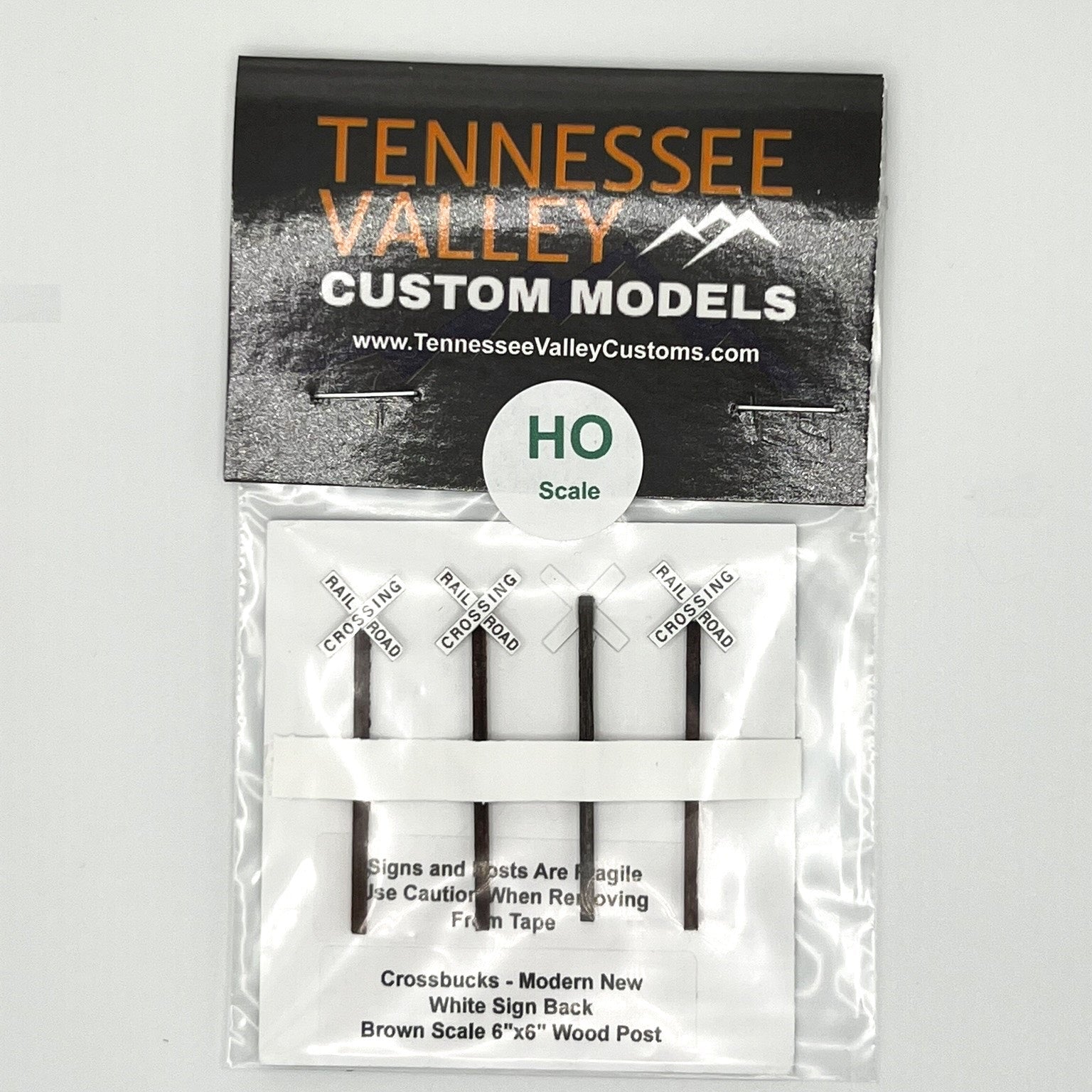 Model Railway Sign, Model Railroad Sign, Modern Cross bucks,White background, x shape, four pack, Model Railroad Layout, Diorama, metal pole, white post, brown post, creosote post, Scale, O Gauge, N Scale, N Gauge, HO Scale, HO Gauge, S Scale, S Gauge 