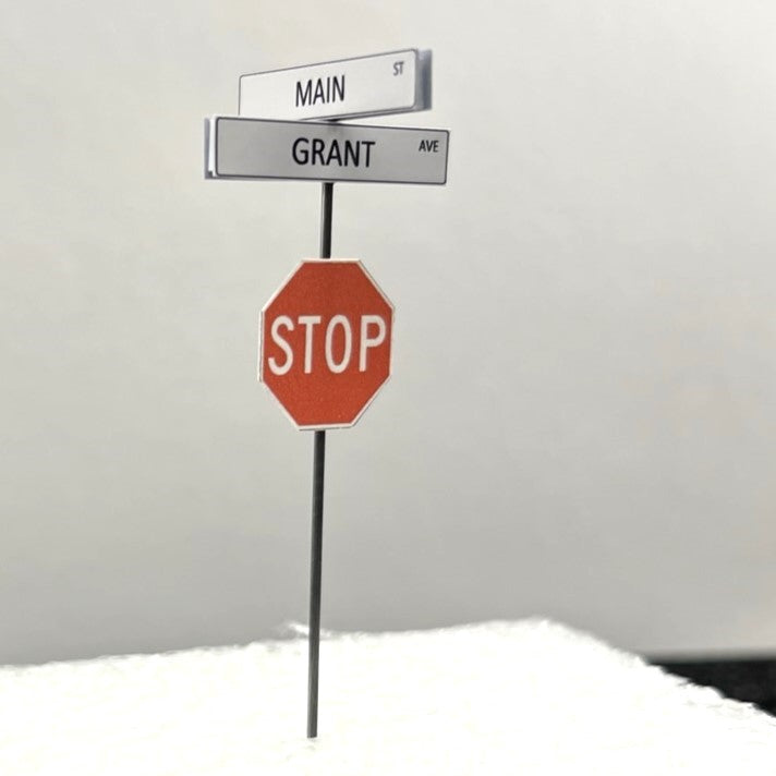 Double Stack Model Railroad Sign atop a Stop Sign Black Lettering White Background