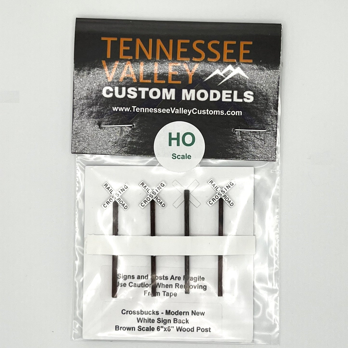 Model Railway Sign, Model Railroad Sign, Modern Cross bucks,White background, x shape, four pack, Model Railroad Layout, Diorama, metal pole, white post, brown post, Scale, O Gauge, N Scale, N Gauge, HO Scale, HO Gauge, S Scale, S Gauge 