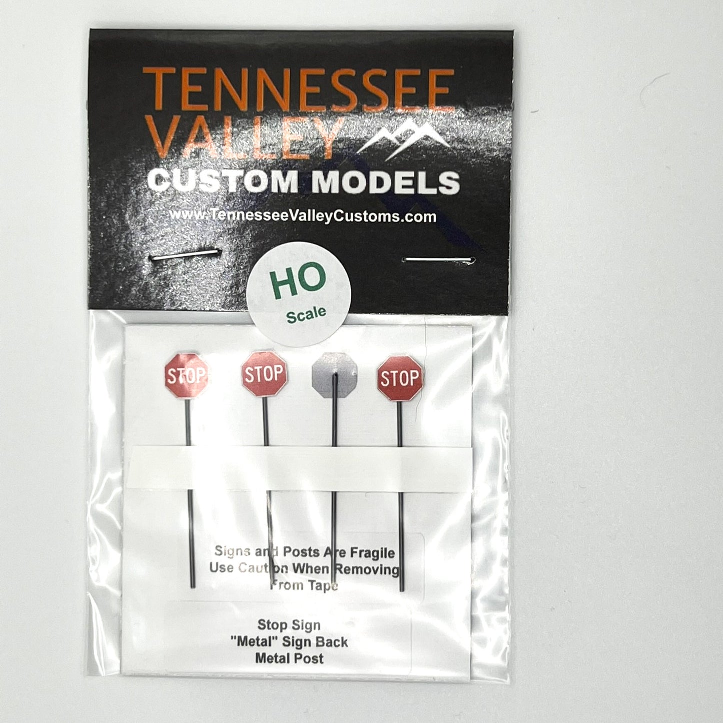 Model Railroad Stop Sign HO Scale package with metal posts